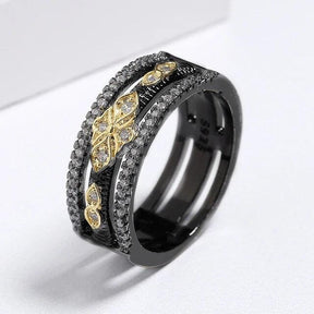 Exquisiter zweifarbiger Ring in Schwarz und Gold