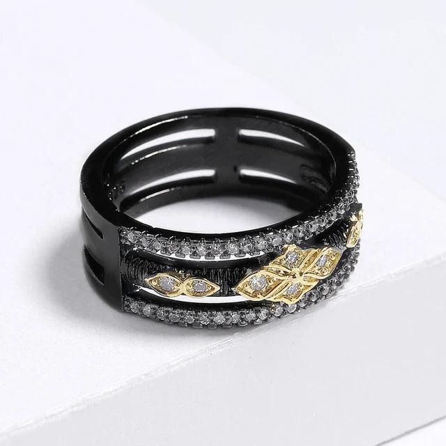 Exquisiter zweifarbiger Ring in Schwarz und Gold