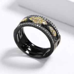 Exquisiter zweifarbiger Ring in Schwarz und Gold